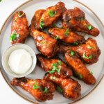 Bbq chicken wings on a plate.