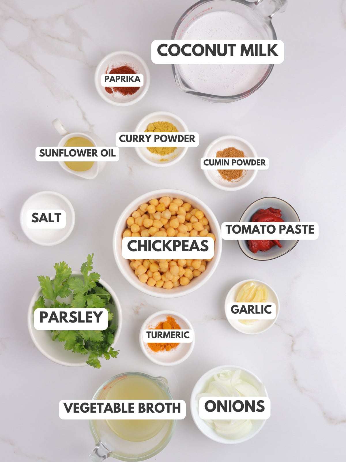 Paprika, coconut milk, curry powder, cumin, oil, chickpeas, tomato paste, garlic, onions, vegetable broth, parsley and turmeric.
