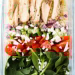 Chicken, spinach, tomatoes, feta onions, cucumber and bulgur wheat.