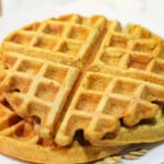 Pumpkin waffle on a white plate.