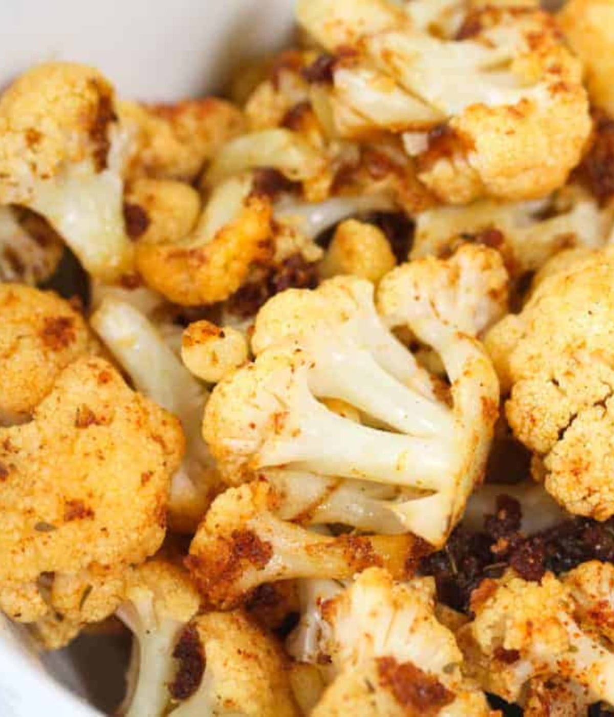 Cajun cauliflower in a white plate.