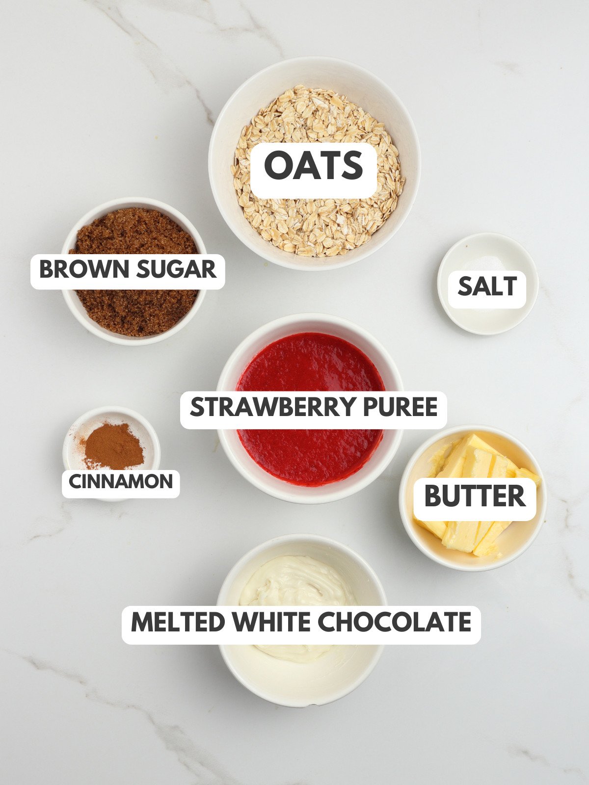 Oats, brown sugar, strawberry puree, salt, butter, cinnamon and melted white chocolate.