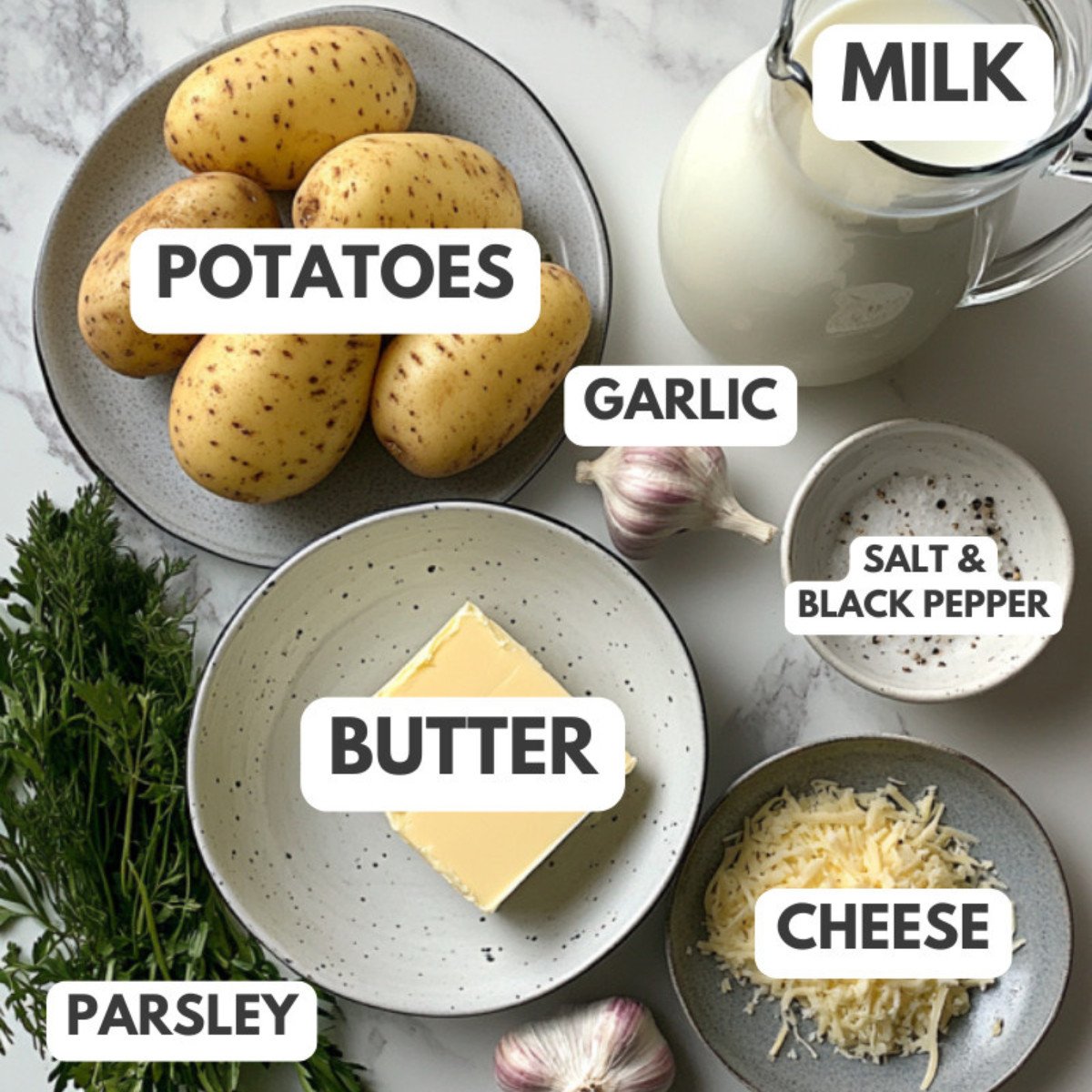 Potatoes, garlic, milk, salt, pepper, butter, parsley and cheese.