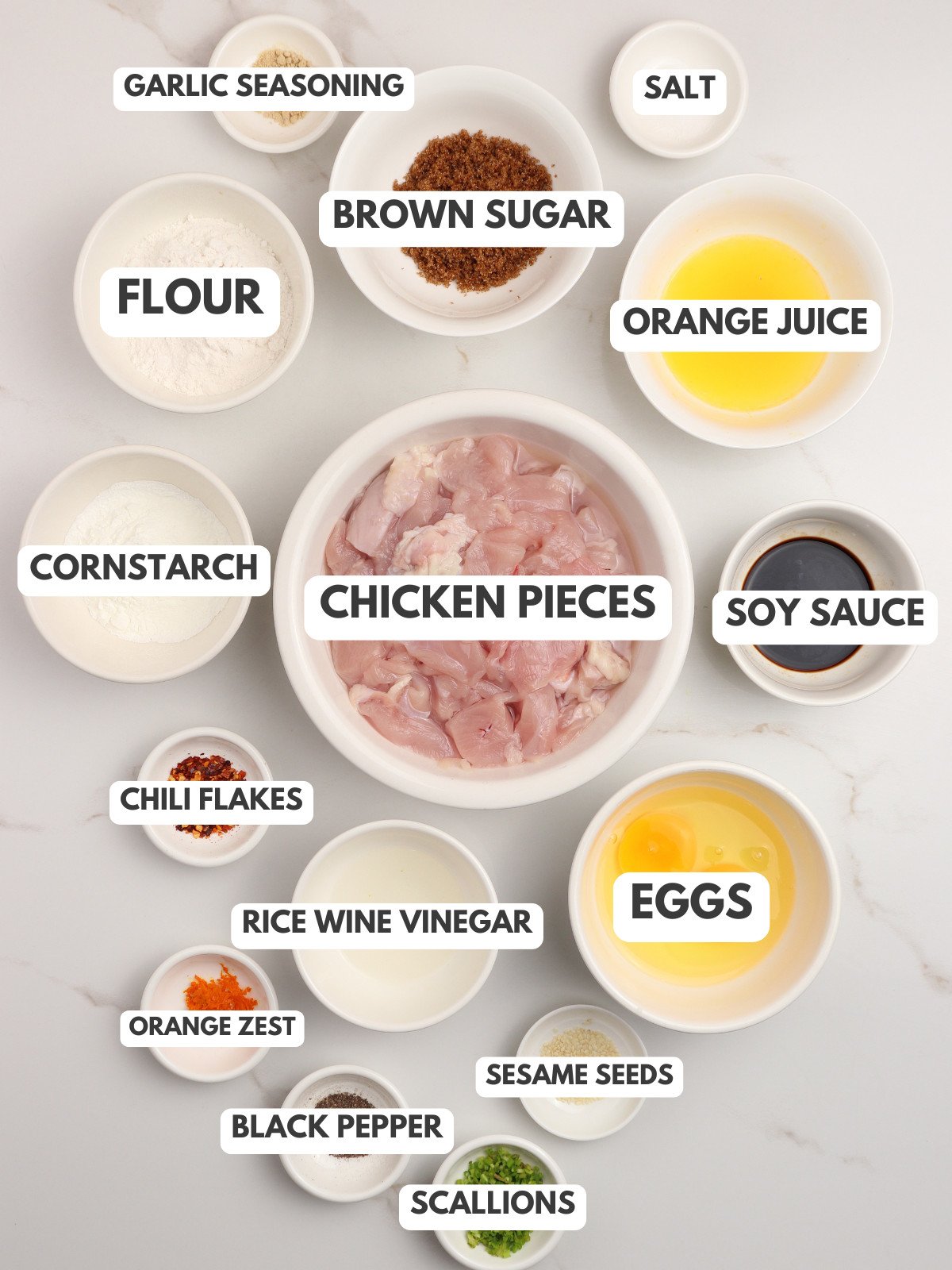 Garlic, brown sugar, salt, orange juice, flour, cornstarch, chicken, soy sauce, eggs, rice wine vinegar and orange zest.