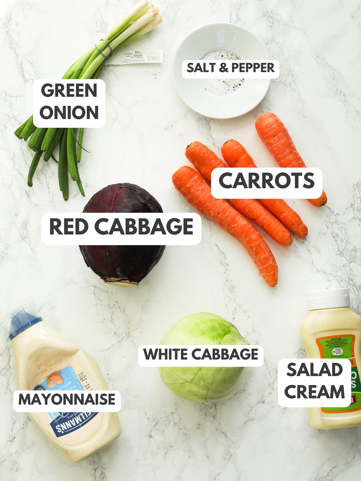 Green onion, salt, pepper, carrots, red cabbage, mayonnaise, white cabbage, salad cream.