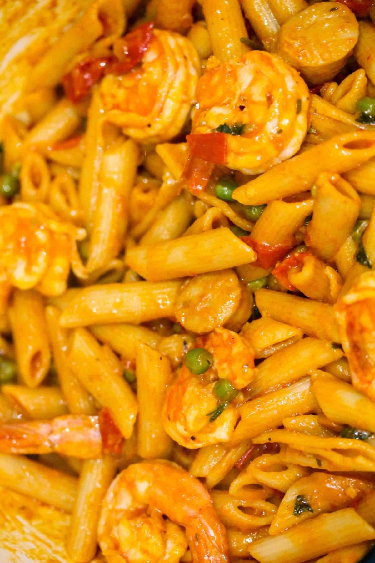 Cajun jamabalaya penne pasta, shrimp, peas and sausage.