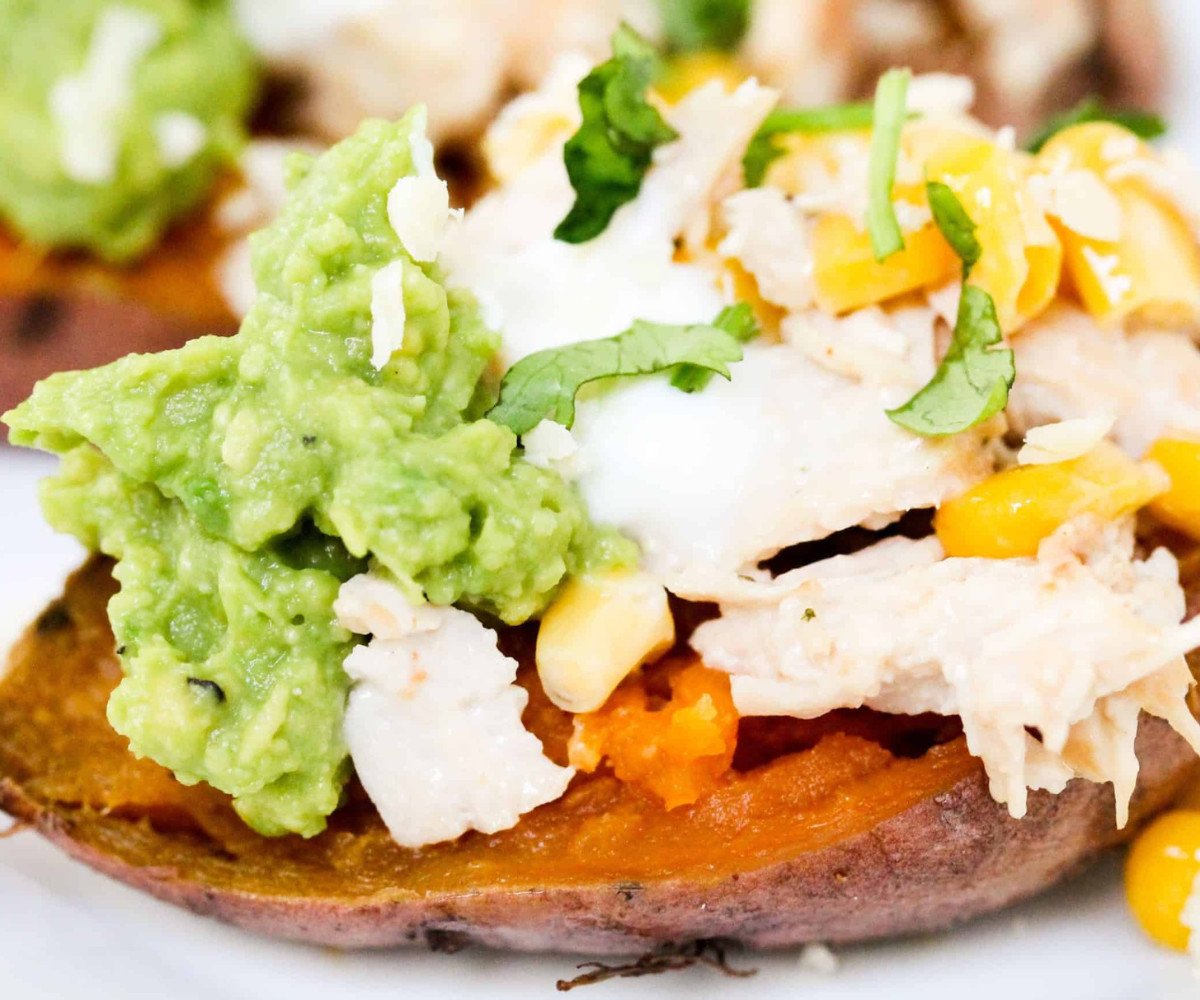 sweet potato filled with shredded chicken, sweetcorn, avocado and sour cream.