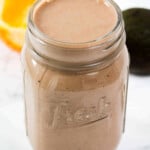 Chocolate banana smoothie in a jar.