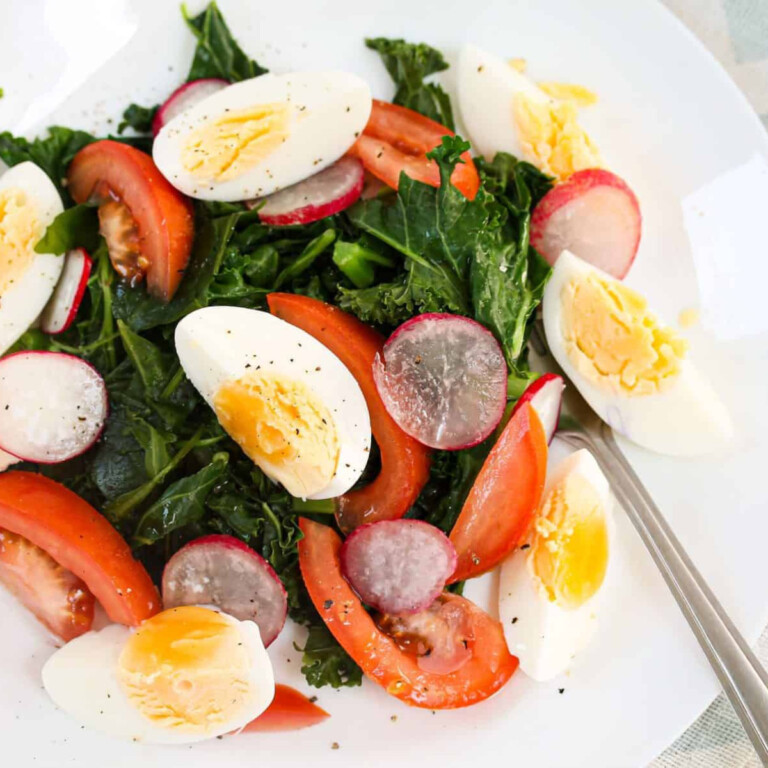 Kale, eggs, tomatoes and radishes.