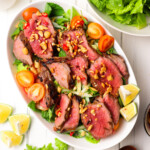 Thai Beef salad in an oval bowl.