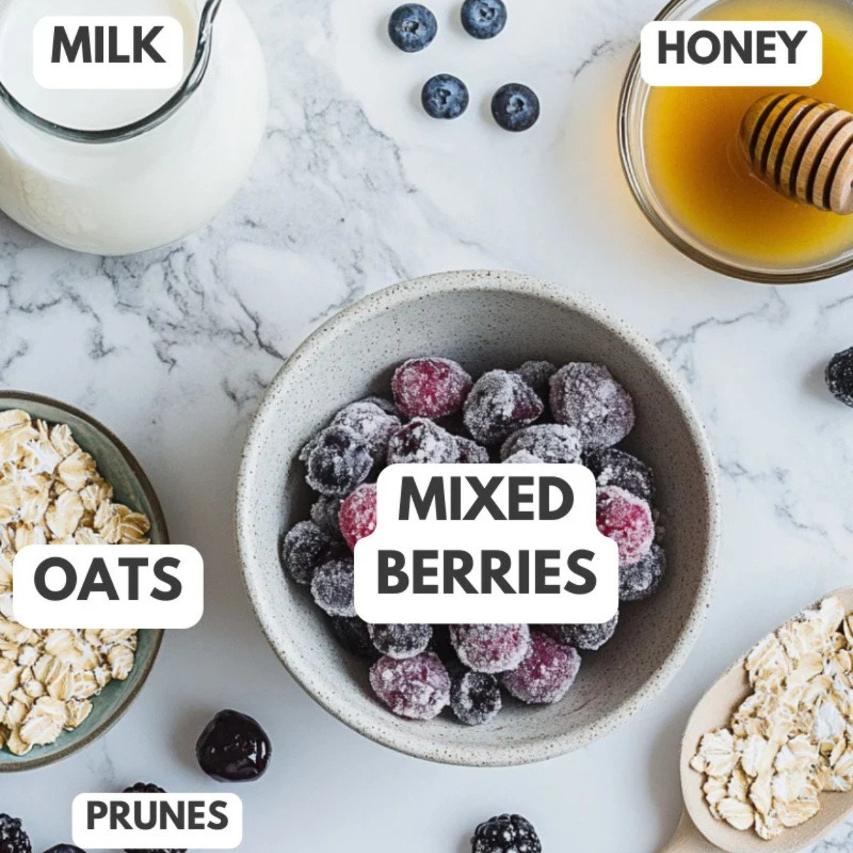 Milk, oats, berries, honey and prunes.