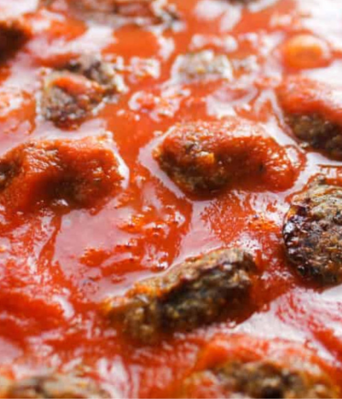 Baked meatballs in tomato sauce.