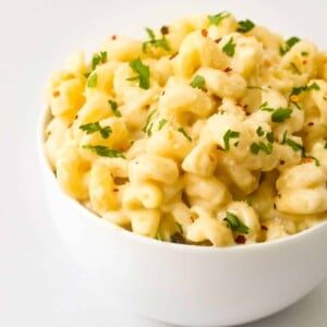 cheesy-homemade-macaroni and elbow pasta in a white ceramic bowl