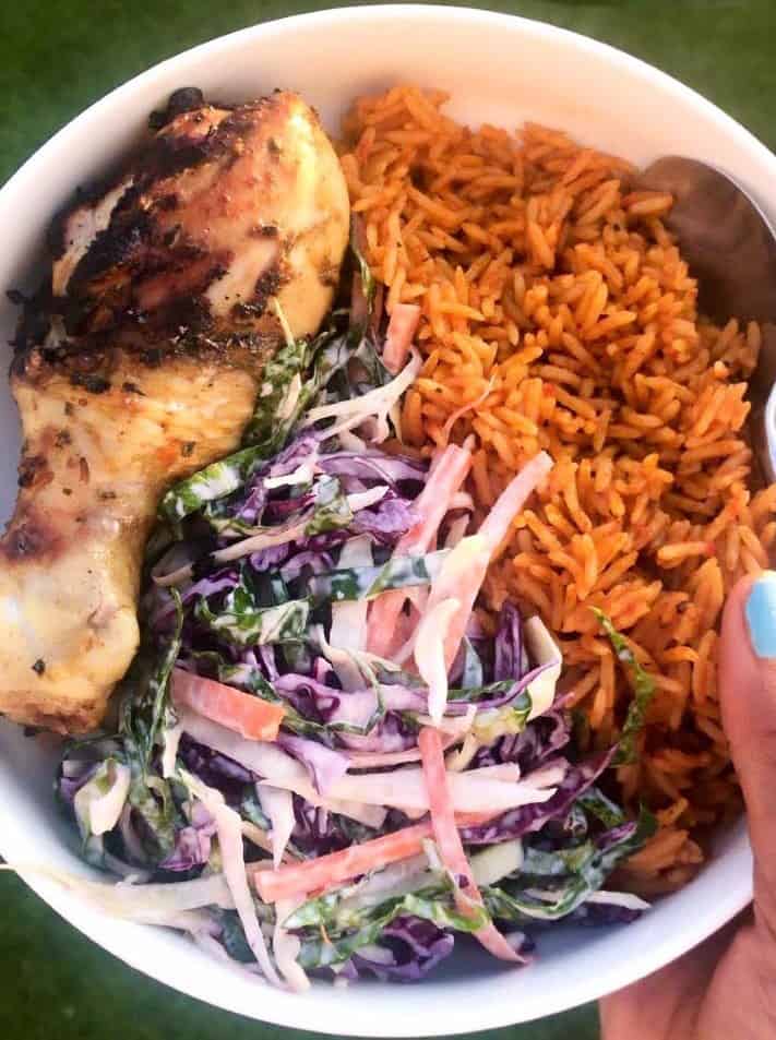jollof rice with chicken and coleslaw