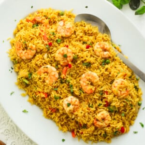 Nigerian-style fried rice on a white plate.