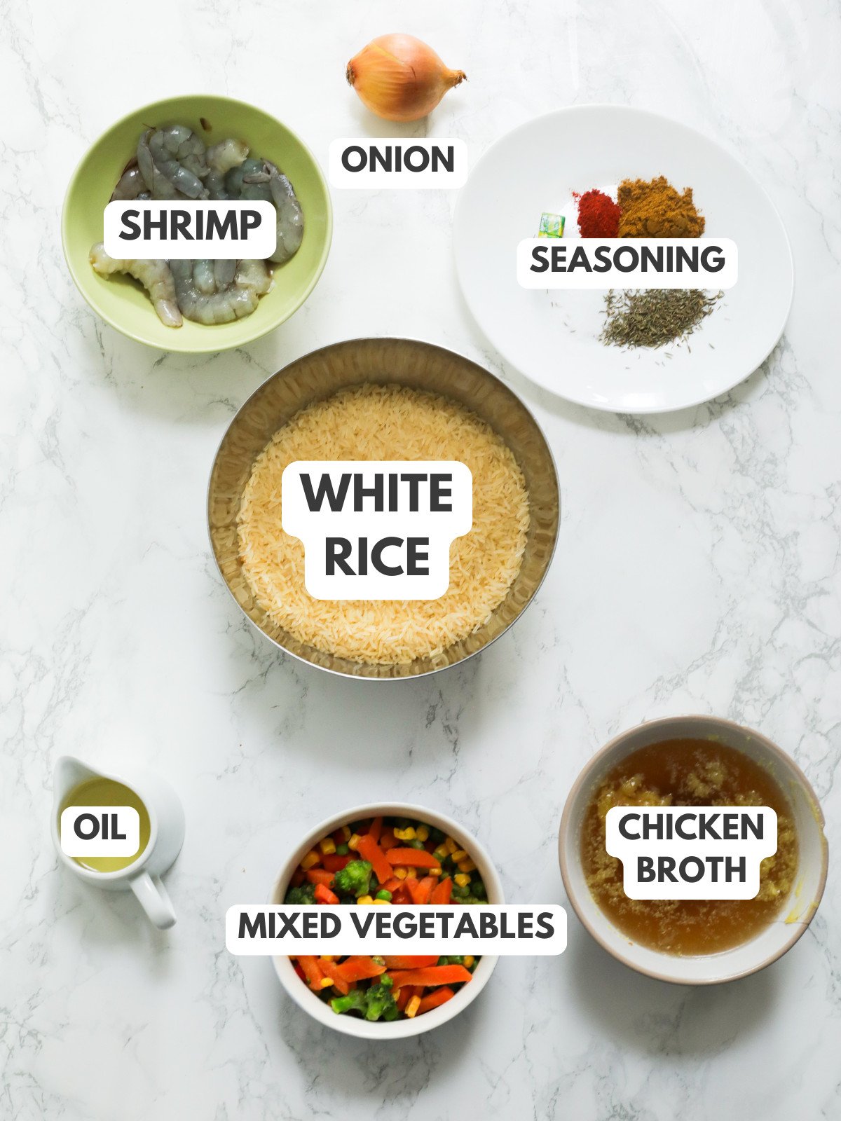 Shrimp, onion, white rice, seasoning, oil, mixed vegetbales and chicken broth.