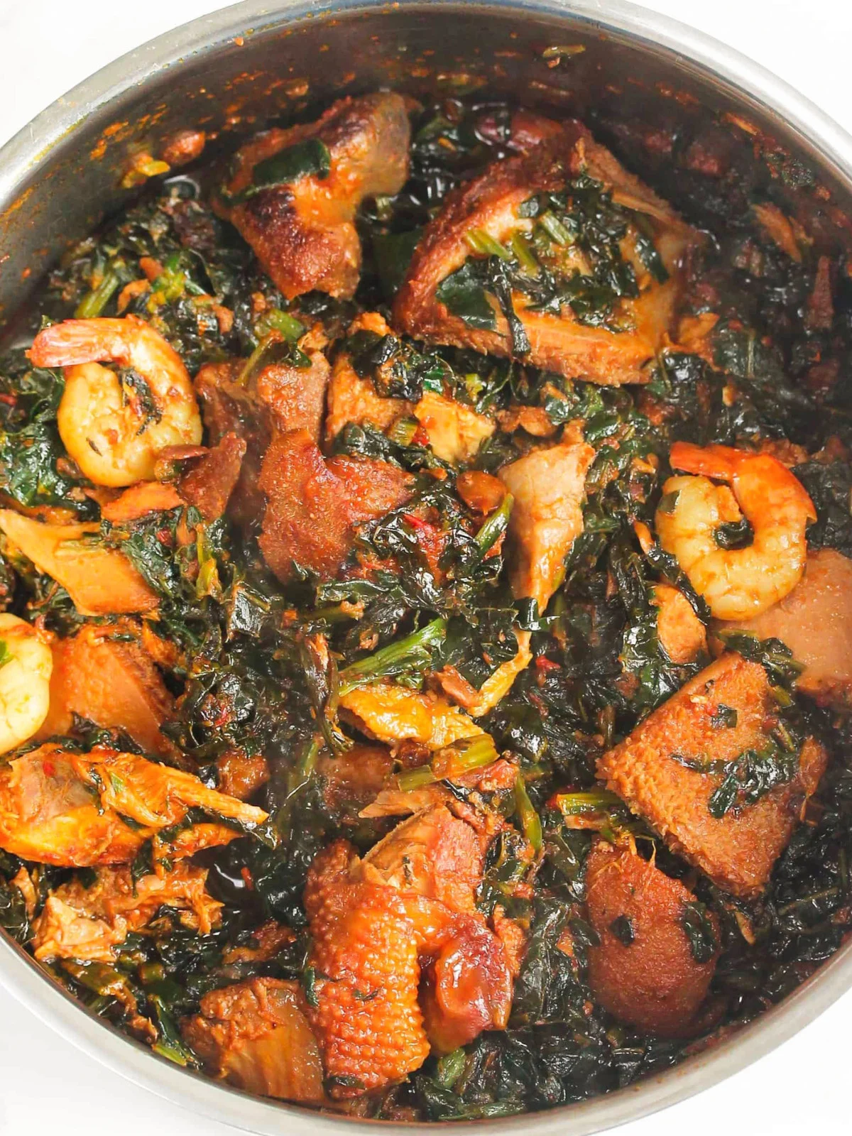Nigerian spinach stew with chicken and shrimp.