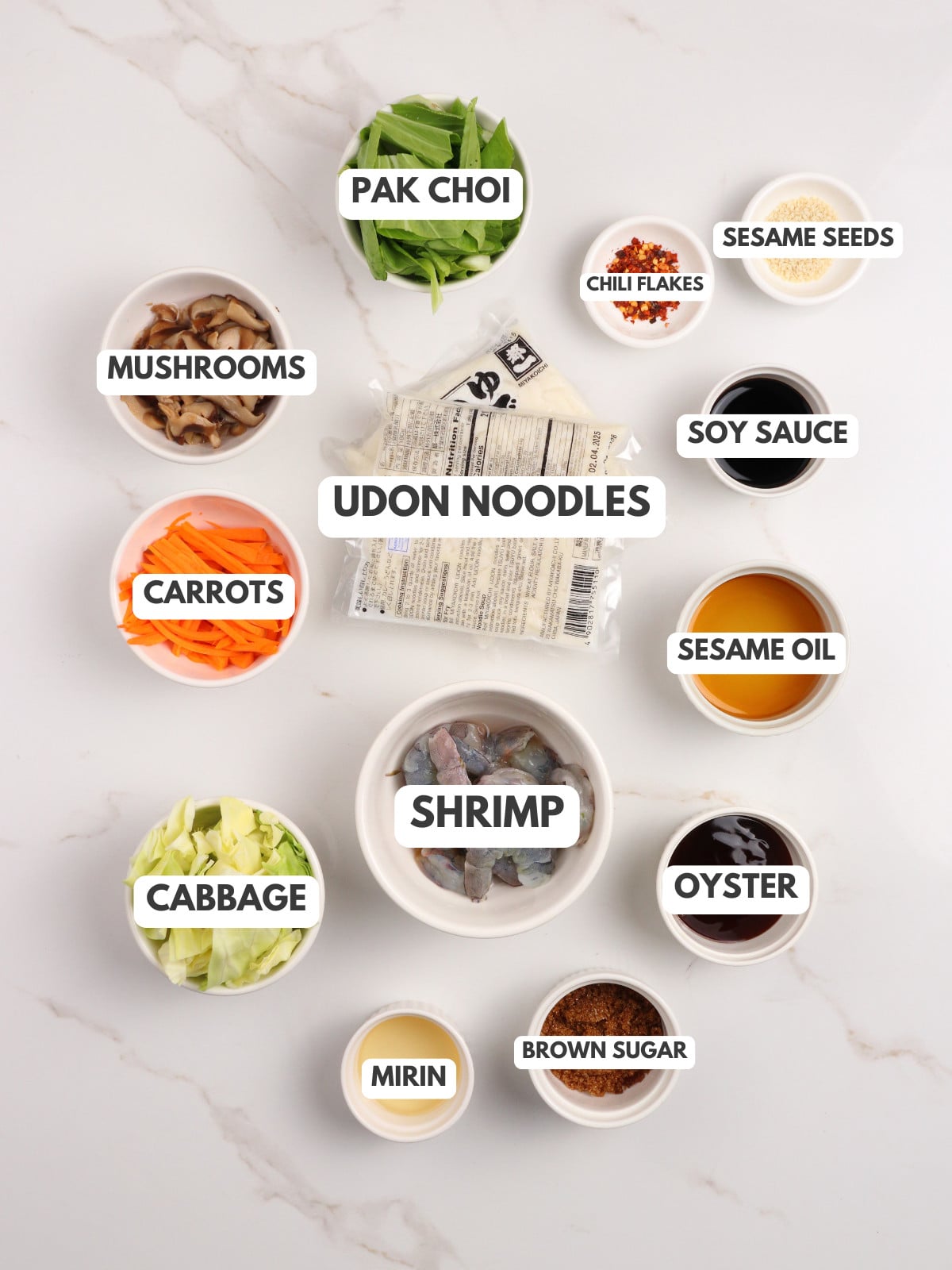 Pak choi, udon, mushrooms, shrimp, carrots, lettuce, soy sauce, oyster, mirin and cabbage.