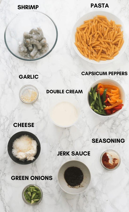 Rasta pasta with jerk shrimp ingredients: pasta, shrimp, garlic, capsicum, double cream, cheese, jerk sauce, seasoning and green onions
