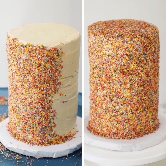 stacked rainbow layer cake with vanilla buttercream coated with sprinkles