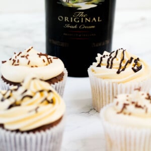 four Baileys infused cupcakes with baileys buttercream