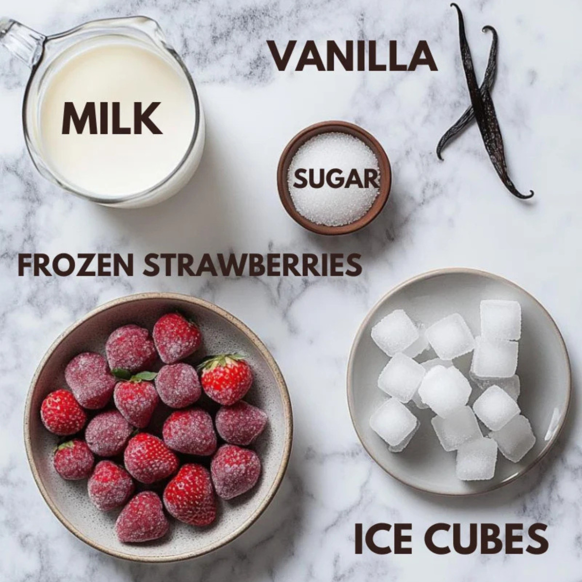 Milk, vanilla, frozen strawberries, sugar and ice cubes.
