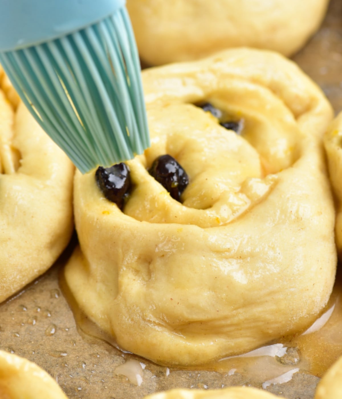 Belgian dough bun basted with egg wash.