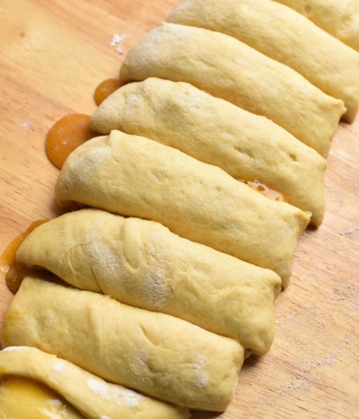Rolled dough filled with fruit curd.
