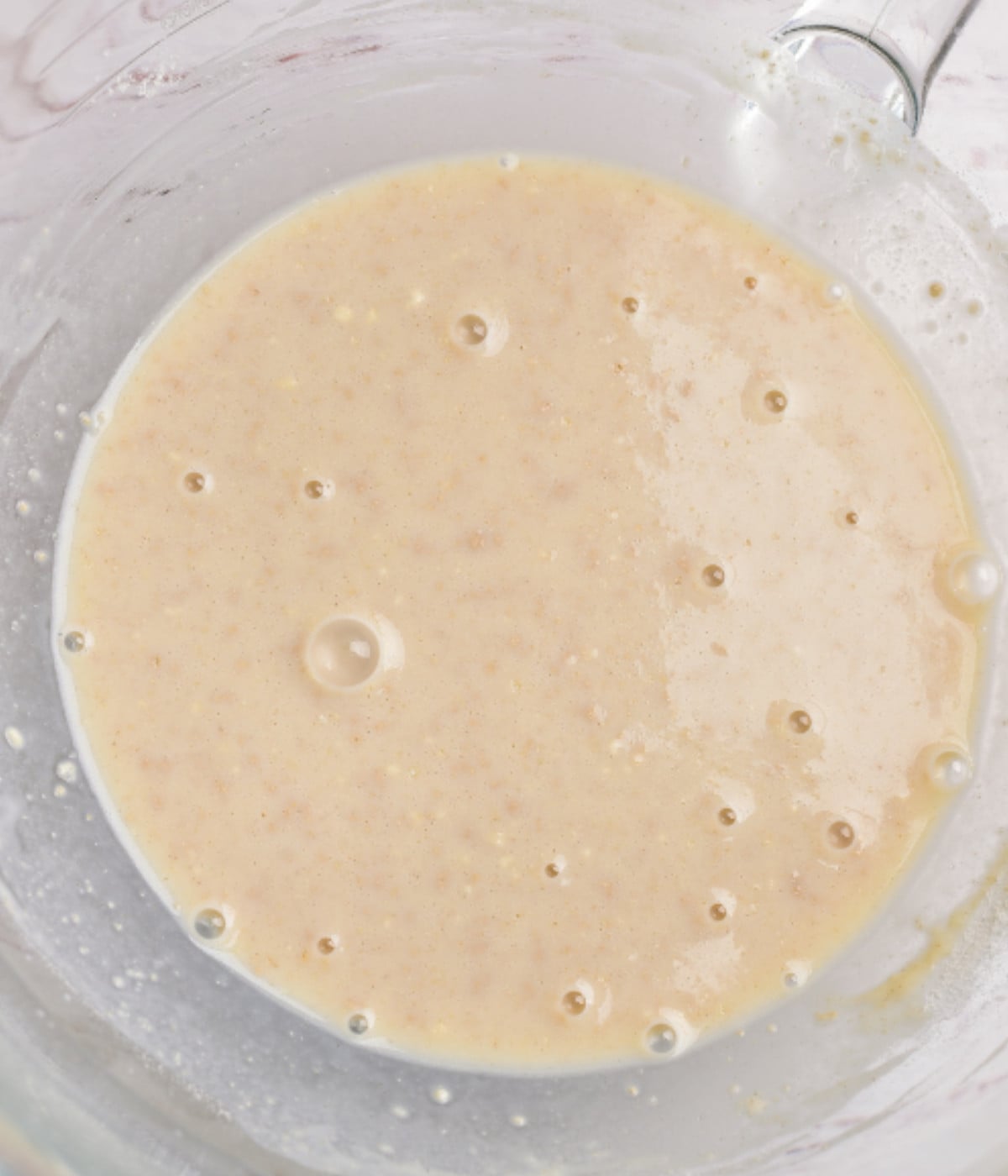 Yeast and warm water in a bowl.