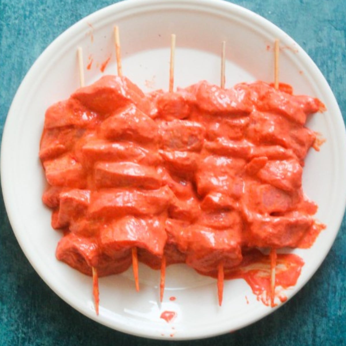 Tandoor chicken on skewers.