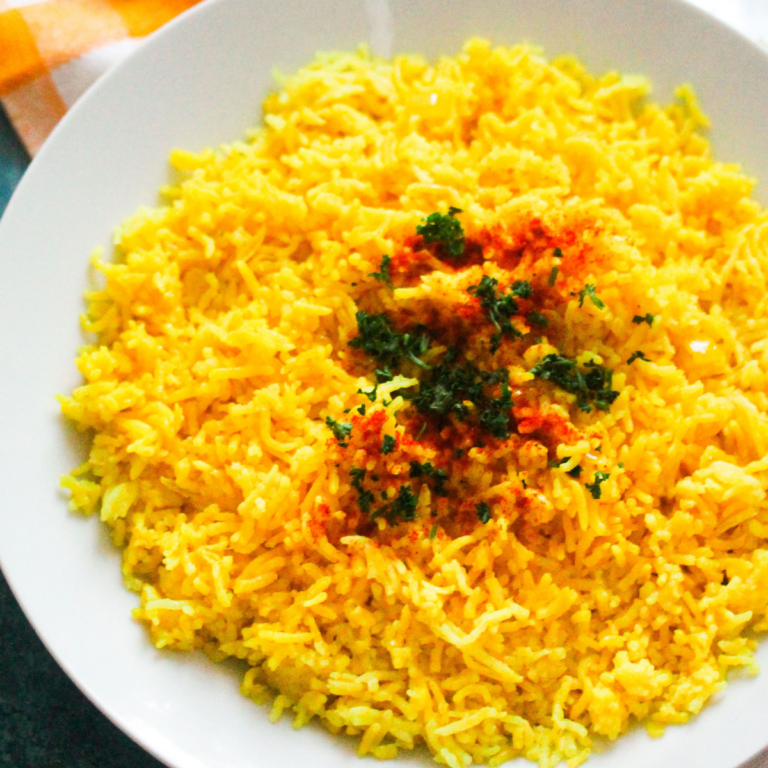 fluffy yellow rice on a plate