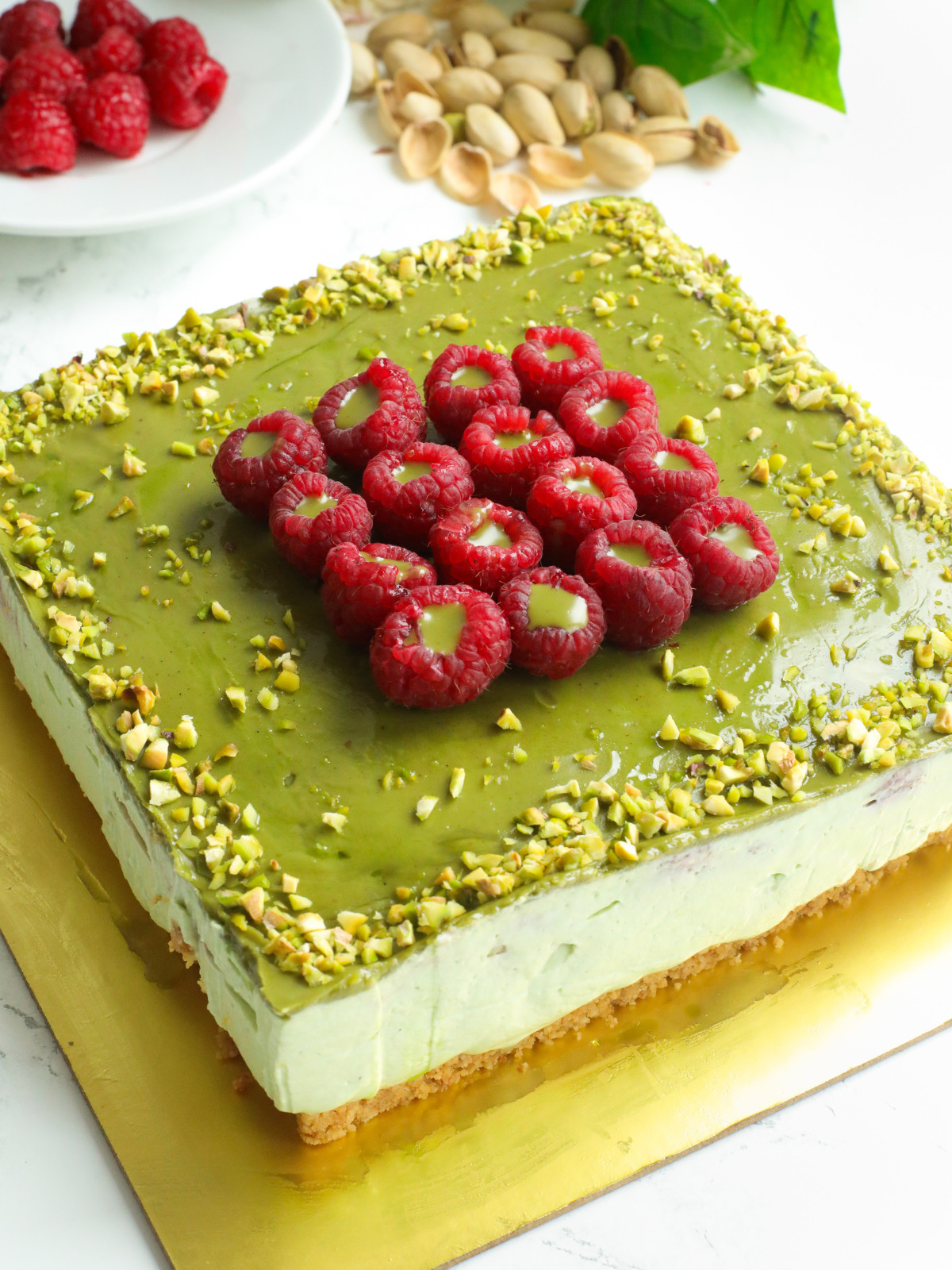Raspberries pistachio cheesecake.