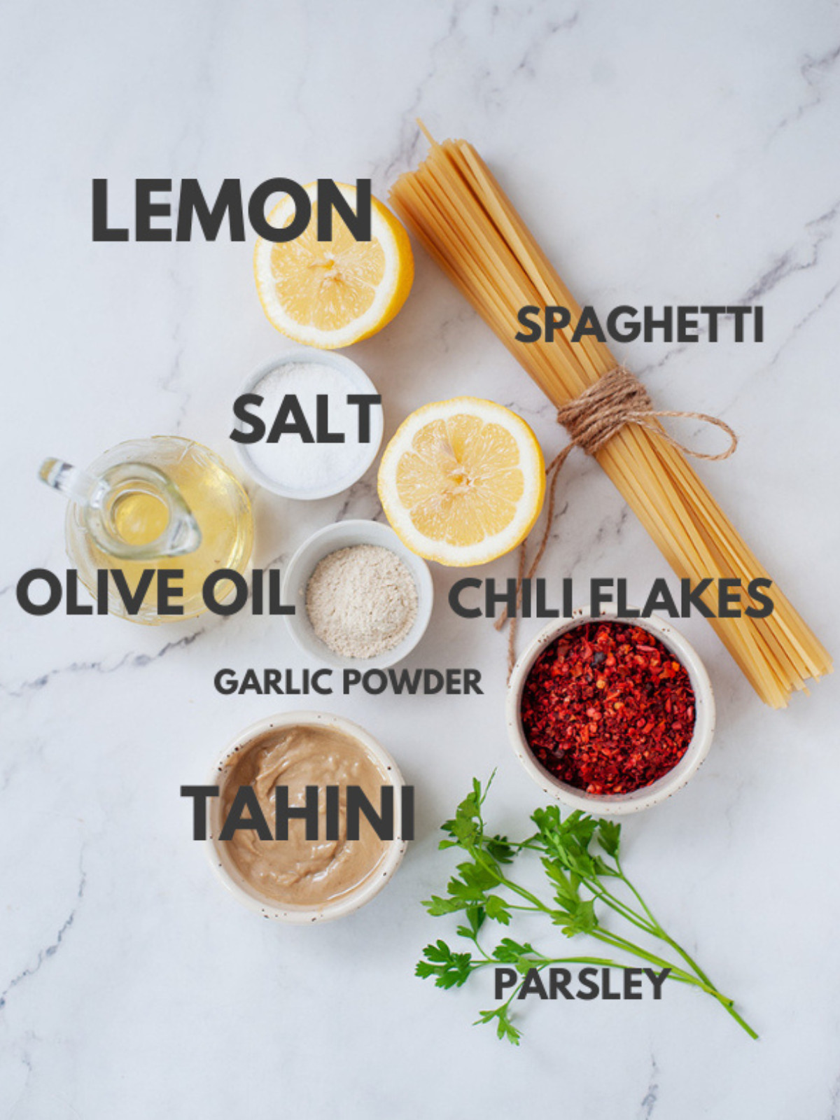 Lemon, spaghetti, tahini, parsley, chilli, lemon, garlic, olive oil and salt.