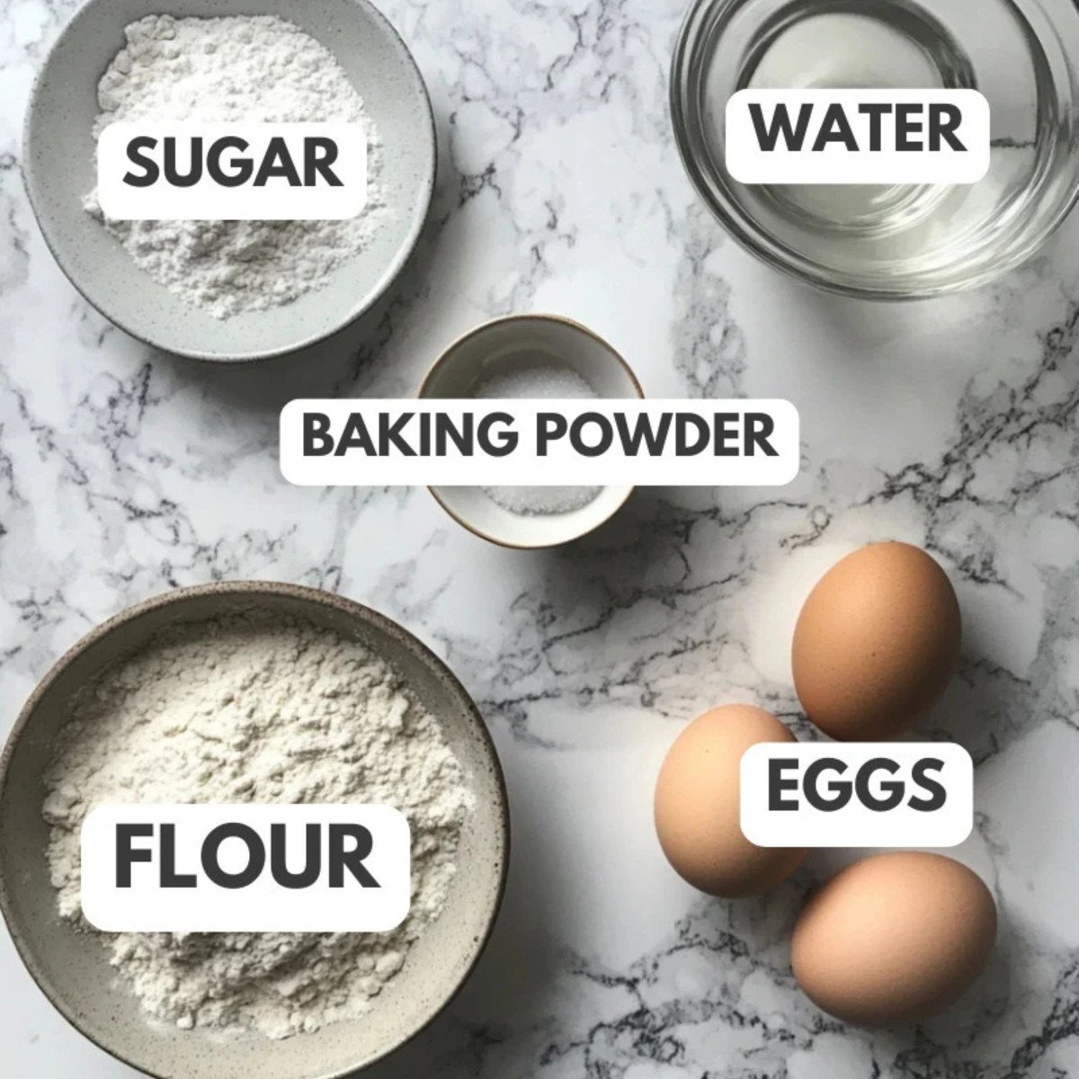 Sugar, water, flour, eggs and baking powder.