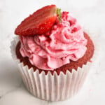 strawberry cupcake with strawberry buttercream.