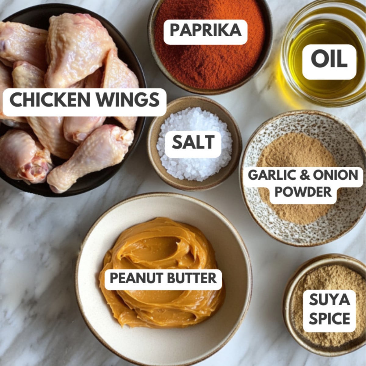 Chicken wings, paprika, oil, salt, garlic and onion powder, peanut butter and suyas spice.