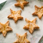Lemon pastry star on parchment paper.