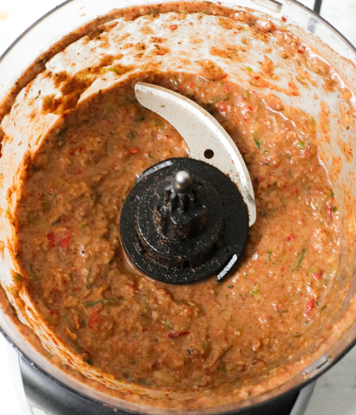 Blended onions, spring onions, scotch bonnets, garlic and warm spices in a food proccessor.