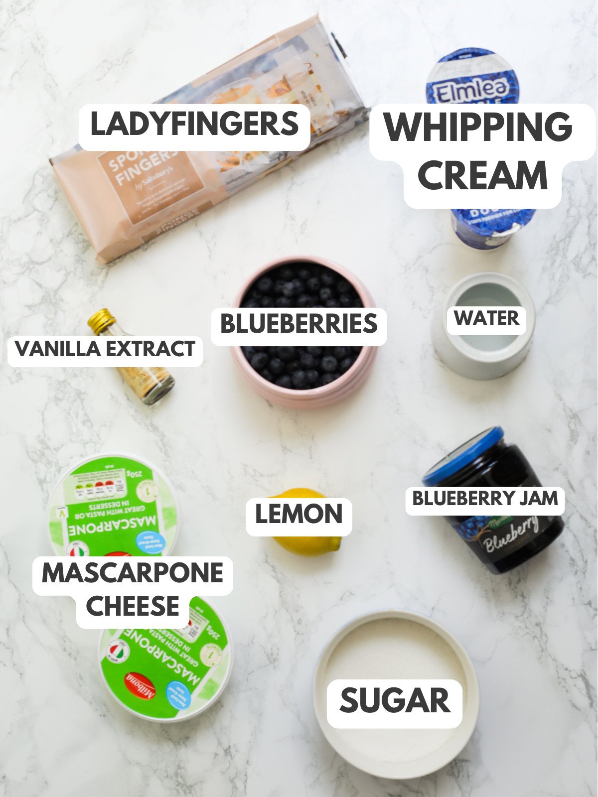 Ladyfingers, whipping cream, lemon, blueberries, water, jam, sugar and mascarpone cheese.