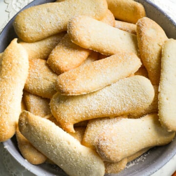 Homemade ladyfingers in a bowl.