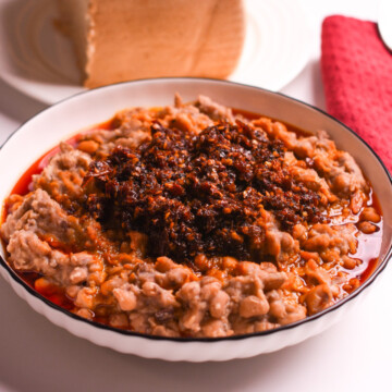 Nigerian ewaagoyin in a white bowl.