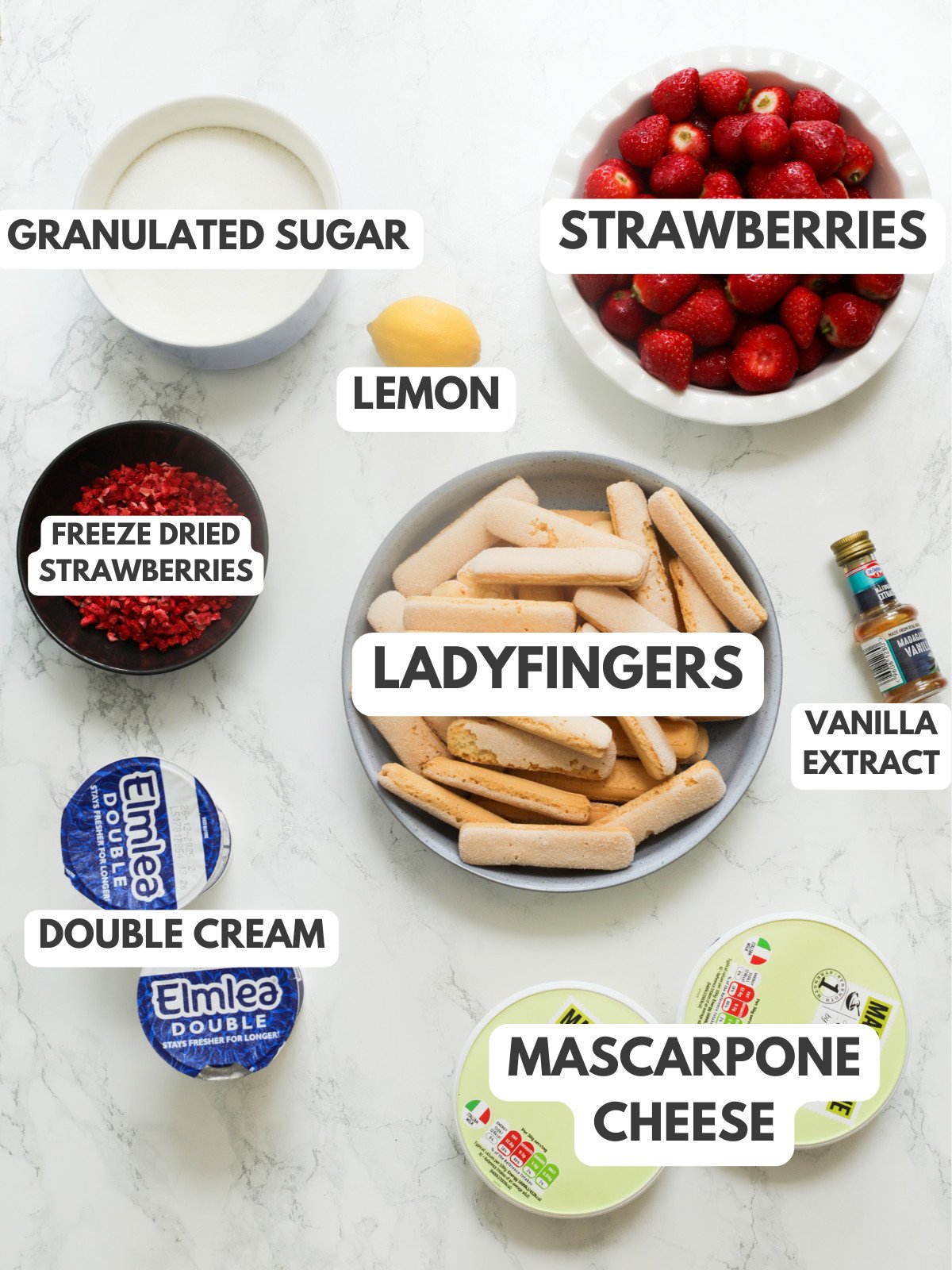 Sugar, lemon, strawberries, ladyfingers, vanilla, freeze dried strawberries, double cream and mascarpone cheese.