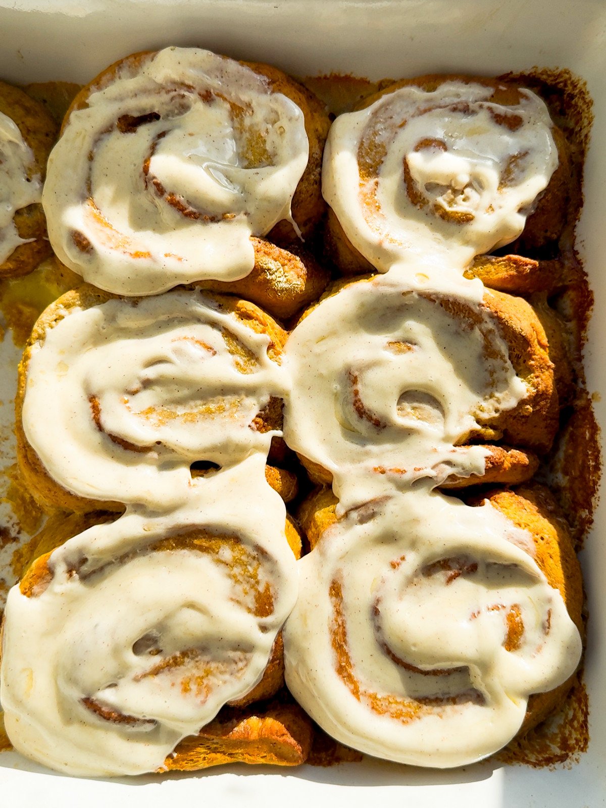 Pumpkin cinnamon bun with cream cheese pumpkin glaze.