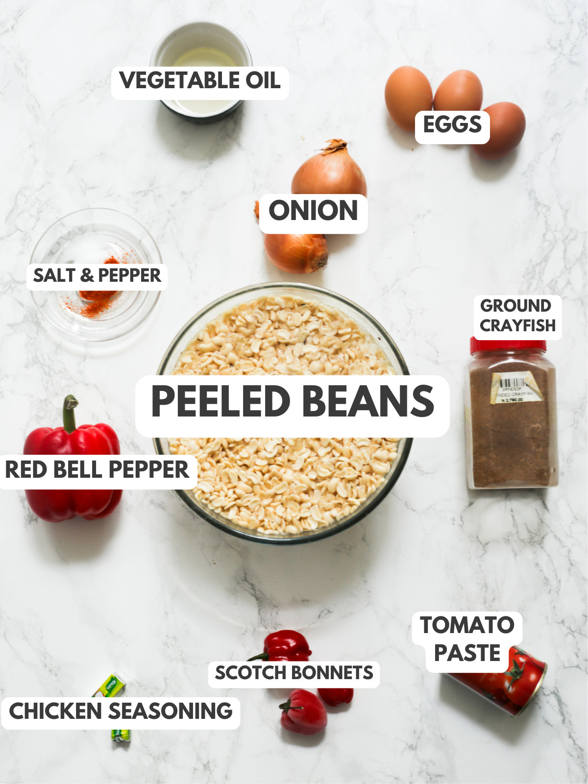 Red bell pepper, onion, scotch bonnet, salt, tomato paste, maggi and peeled beans.