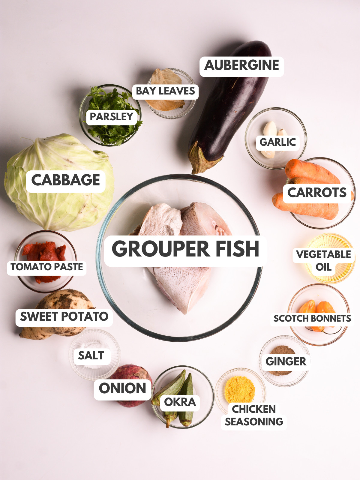 Cabbage, parsley, bay leaves, aubergine, garlic, carrots, scotch bonnets, grouper fish, cabbage and seasoning.