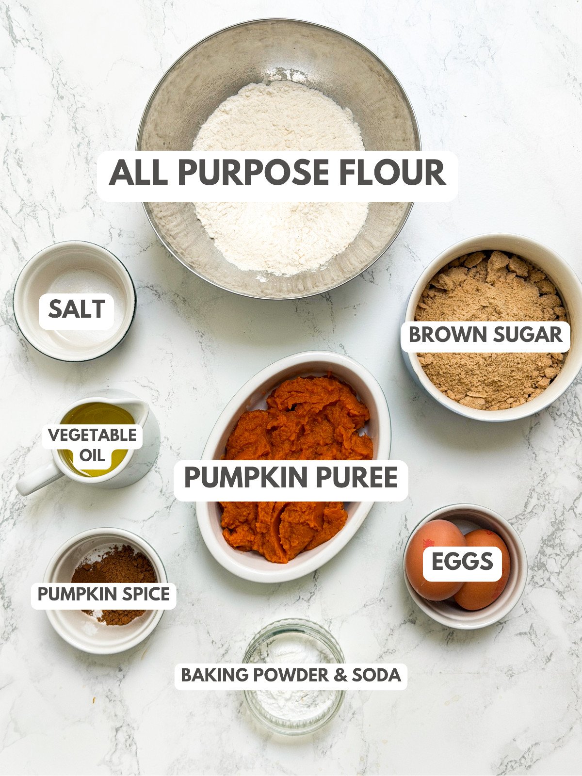 Salt, flour, pumpkin puree, brown sugar, eggs, oil, leaveaning agents and pumpkin spice.