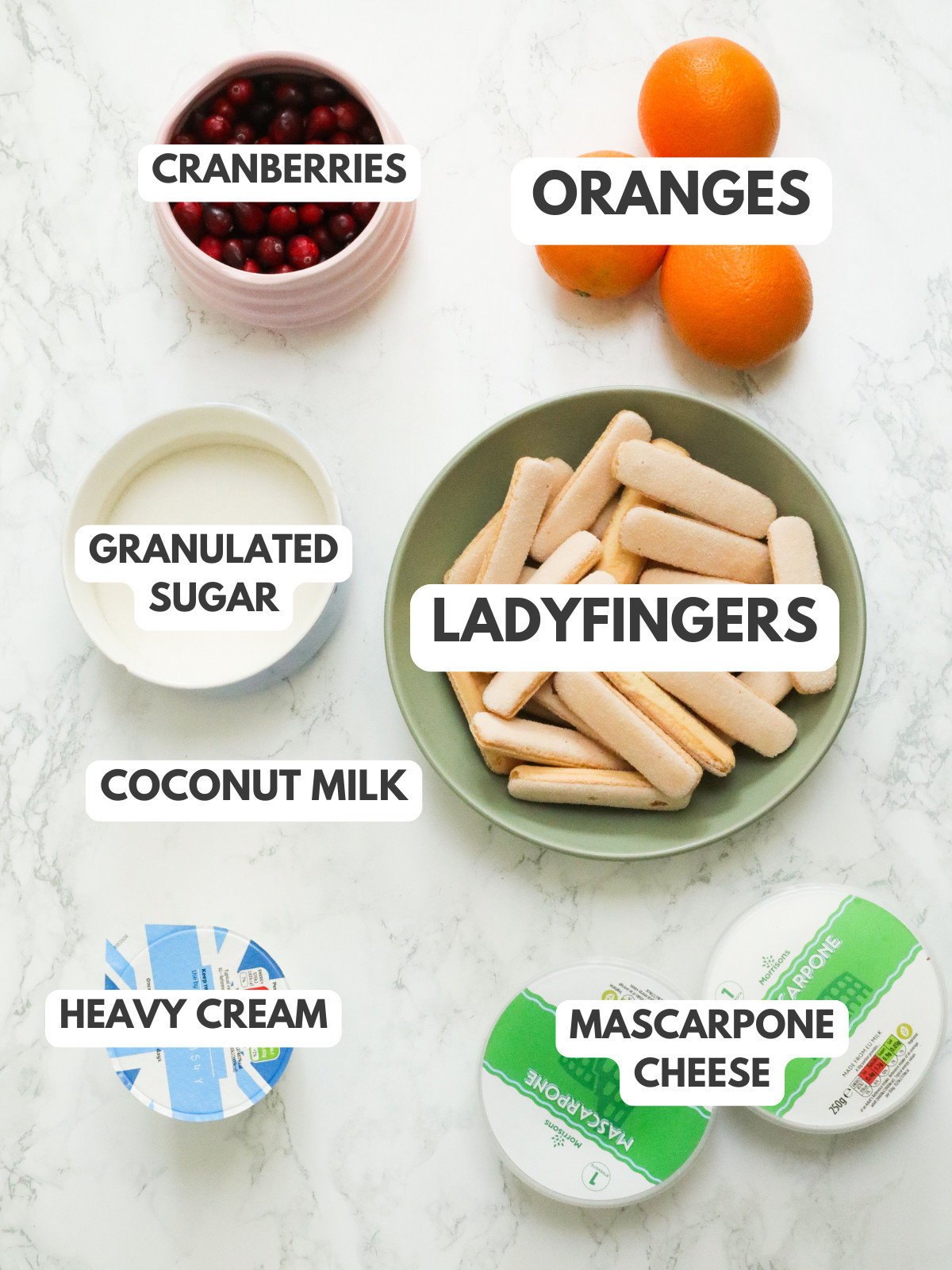 Ladyfingers, cream, mascarpone, sugar andoranges and cranberries.