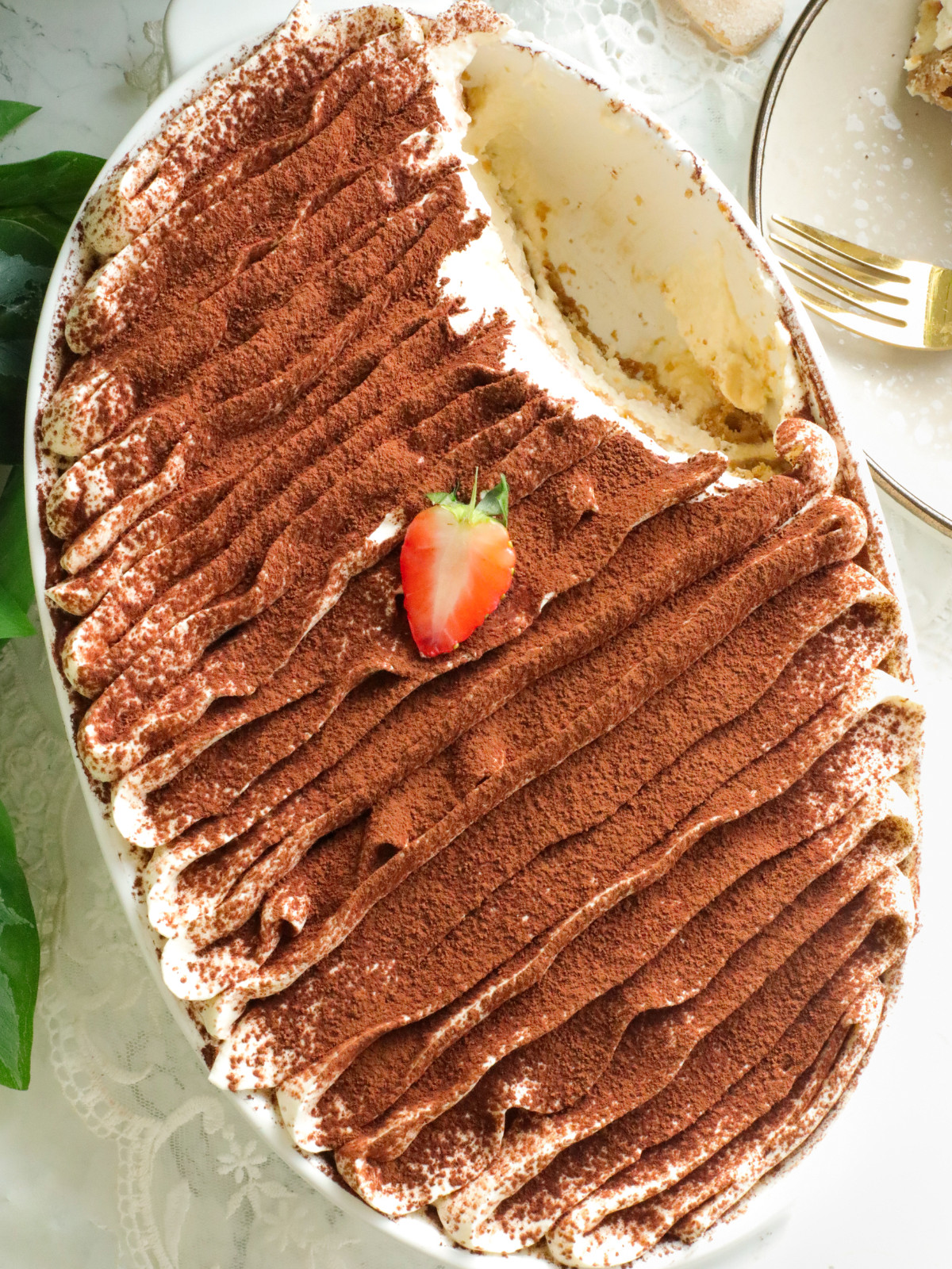 Bailey tiramisu in a white oval dish.