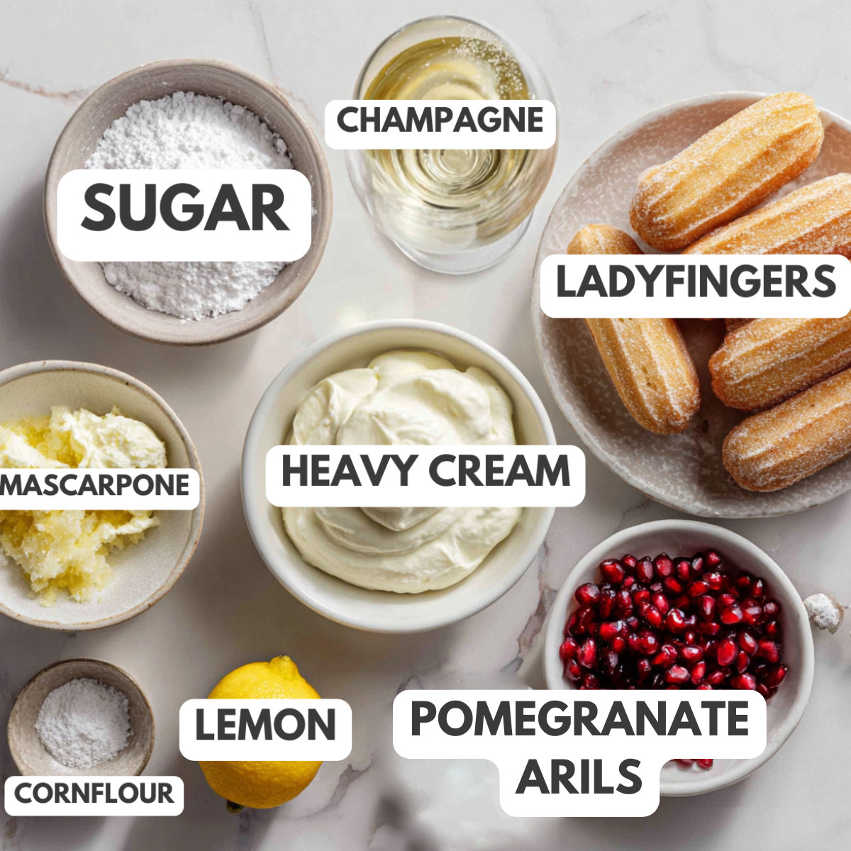Champagne, heavy cream, mascarpone, ladyfingers, pomegranate arils, sugar and lemon.
