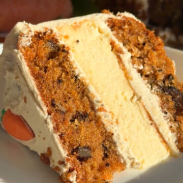 A carrot cake cheese cake on a plate.